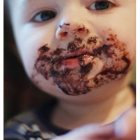 Child with chocolate on his face