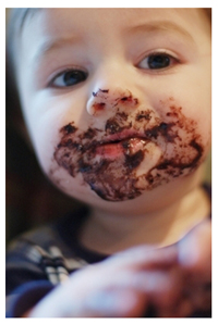 Child with chocolate on his face