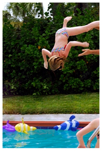 Girl jumping in pool