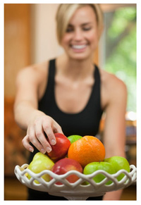 Woman eating fruit