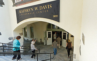 A sign marking the entry to the newly renovated Sleepy Hollow bathhouse now known as the Kathryn W. Davis RiverWalk Center.