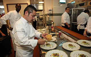Executive Chef Chiharu Takei putting final touches to the Lobster and Seasonal Vegetables  Terrine.