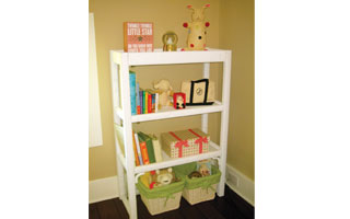 Decorative baskets and colorful boxes provide easy storage for stuffed animals and other toys in the nursery.