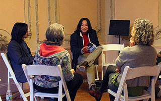 Yibing Huang (Mai Mang) reads to a small group in last year’s line of up international poets. Also pictured are Lynn Francis and Floyd Cheung.