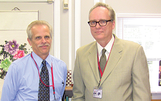 John Staiger, Jr., Asst. Supt. of Business Christopher Clouet, Superintendent