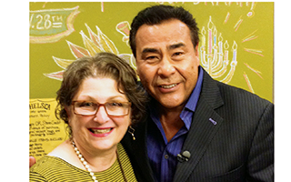 Owner Lisa Globenfelt and Host John Quinones