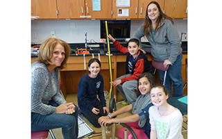 Briarcliff Manor students show off their roller coaster.