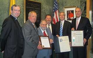  From left, Father Thomas Collins, President of Stepinac High School; William F. Plunkett, Chairman of the Board; Ron Tedesco, honoree; Paul Carty, Principal; Thomas Roach, Mayor of White Plains; Kevin Plunkett, Deputy County Executive. Tedesco was presented with proclamations from Tarrytown, White Plains and Westchester County for his remarkable milestone.