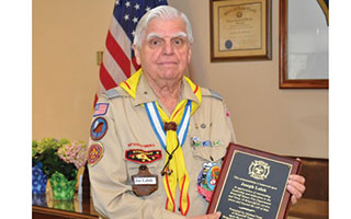 oseph Lalak receiving a plaque  at firefighter's luncheon  sponsored by Michael Feist