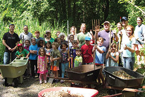 Volunteers worked tirelessly to prepare Peabody Preserve Outdoor Classroom for its grand opening.