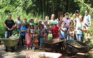 Volunteers worked tirelessly to prepare Peabody Preserve Outdoor Classroom for its grand opening.