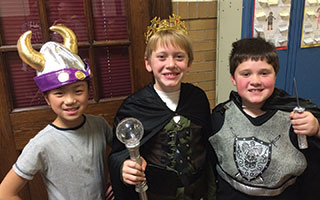 Washington Irving students Cynthia Cai, Cooper Taylor, and Carver Lis dressed up for Shakespeare Night.