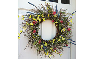 Brighten your door with a Spring Wreath featuring pussy willow, wild grasses, and forsythia blooms.