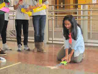 An Irvington Middle School seventh-grader enrolled in Project Lead the Way’s rigorous design and modeling class tests a skimmer as part of a unit of study on measurement.