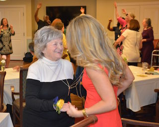 Kay Kiggins is a Charter Club Resident of Brightview Tarrytown’s secured memory care neighborhood, Wellspring Village.  She enjoyed all the festivities of the night celebrating with friends, family and her new neighbors.