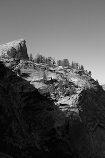 The peak of Half Dome appears in the distance  during the final portion of an 8-mile ascent.