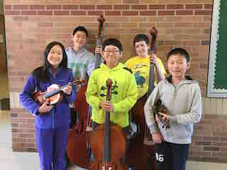 (from left) All-County Junior Orchestra students Reinesse Wong, Ryan Liu, Seungchan Yun, Leo McLaughlin and Andrew Zhou.