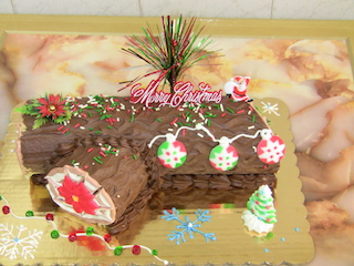 A very popular Yule Log, a yellow sponge cake filled with fudge. 