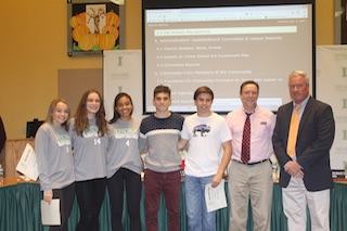 L-R: Irvington High School students Miranda Farman, Jess Greene, Zoe Maxwell, Luke Caromsino and Eric Pastarnack, cross-country coach Chris Barry and Athletic Director Arthur McCormack.