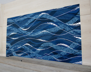 Clancy Designs Glass Studio from Jamestown, Rhode Island created the mural especially for this Hudson River location.