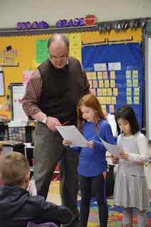 Theater educator Peter Royston teaches Dows Lane Elementary School second-graders how to tell a story in Bringing Literature to Life.