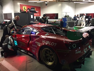 A Ferrari competitor prepares for night practice ahead of the 24 hour race