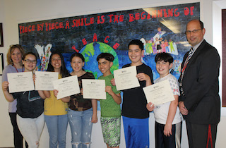 Sleepy Hollow Middle School student winners for Make Art, Not Hate, accompanied by Art Teacher Andrea Harrison and SHMS Principal Joshua Whitham.