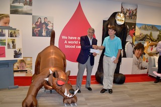 Leukemia & Lymphoma Society CEO Dr. Louis DeGennaro thanked Briarcliff’s Robbie Beard for raising funds for the cause.