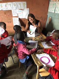 Dows Lane Elementary School teacher Laurel Warager spent two weeks in Kenya educating children through literacy and health fitness programs.