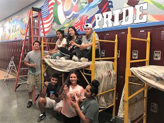 Students helped paint a Pride mural at Ossining High School.